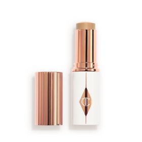 UNREAL SKIN SHEER GLOW TINT FEUCHTIGKEITSSPENDENDER FOUNDATION-STICK 5 MEDIUM