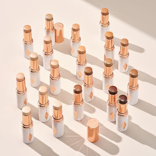 UNREAL SKIN SHEER GLOW TINT FEUCHTIGKEITSSPENDENDER FOUNDATION-STICK 16 DEEP